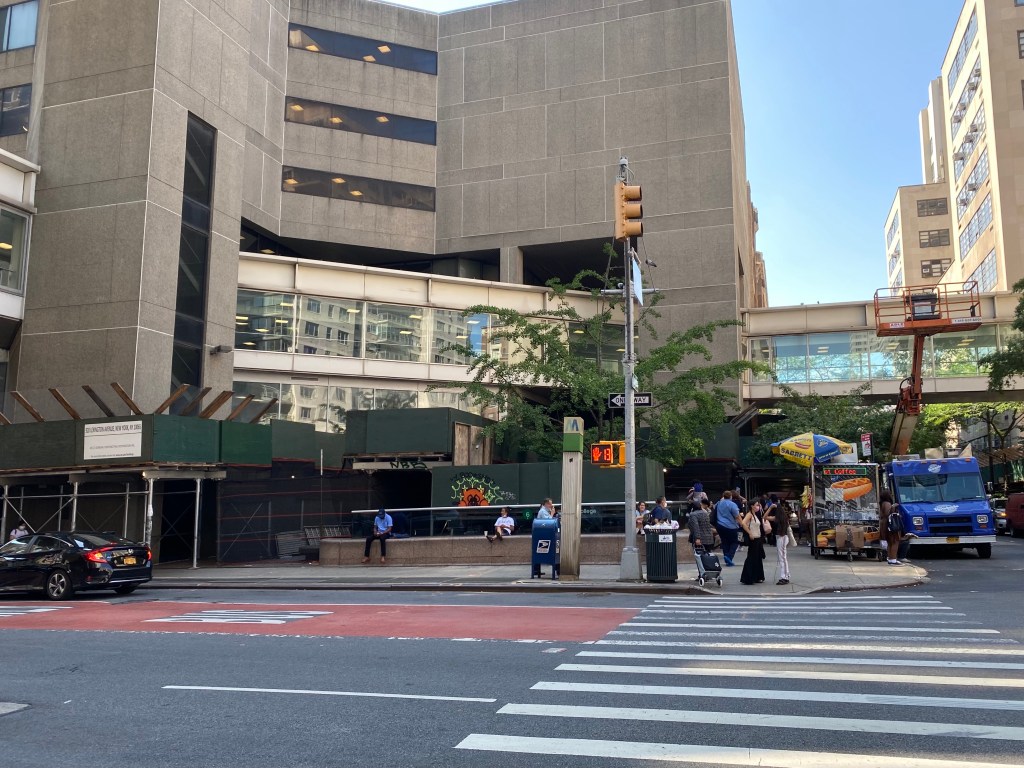 The Hunter College subway station under scaffolding.