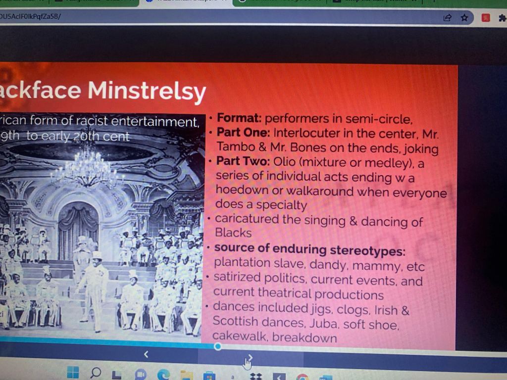 The image is a screenshot of a slide from Brungard's Prezi presentation. It is titled Blackface Minstrelsy. It shows an image of a minstrel show and text that describes dances performed at minstrel shows. 